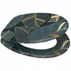 A toilet seat with a monstera leaf pattern. Produktbild-Vorschau