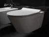 A modern white wall-mounted toilet and bidet in a dark bathroom. Anteprima dell’immagine prodotto
