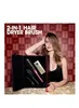 A woman is posing with a hair dryer brush set in a case. Produktbild-Vorschau