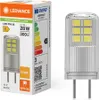 A product shot of an LED light bulb and its packaging. Produktbild-Vorschau