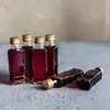 12er Set Glasflaschen 100 ml eckig mit Schraubverschluss – Produktbild-Vorschau 5