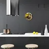 A modern kitchen scene with a clock on the wall and kitchen appliances on the counter. Produktbild-Vorschau