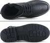 A top-down view of a black boot and a bottom view of its sole. Anteprima dell’immagine prodotto