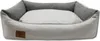 A dog bed with raised sides and a cushioned center. Anteprima dell’immagine prodotto