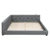 A gray upholstered daybed frame with a slatted mattress support is shown from the side against a white background. Produktbild-Vorschau