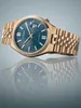 A gold Citizen watch with a teal dial is shown against a reflective, gradient background. Podgląd zdjęcia produktu