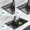 A collage of images showing a stainless steel kitchen sink with a faucet and a drying rack with fruit. Podgląd zdjęcia produktu