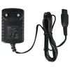 A black power adapter with a coiled black cord and a connector. Produktbild-Vorschau