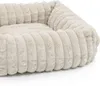 A close-up view of a soft, plush pet bed with a ribbed texture. Produktbild-Vorschau