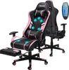 Two gaming chairs are shown, one in the foreground with a footrest extended, and another in the background. A remote control is visible in the upper right corner. Produktbild-Vorschau