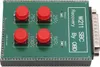 A circuit board with buttons and text, connected to a silver connector. Voir les images du produit