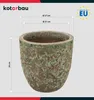 A ceramic pot with dimensions indicated by lines and text. Voir les images du produit