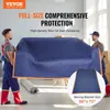 Two movers are carrying a couch covered in a blue moving blanket. Anteprima dell’immagine prodotto