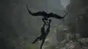 A person is being carried by a large bird over a rocky, mountainous landscape. Produktbild-Vorschau