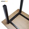 The underside of a wooden table with black metal legs attached. Anteprima dell’immagine prodotto