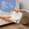 Hands holding a roll of diaper pail bags over an open diaper pail. Produktbild-Vorschau