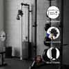 A gym setting with various weightlifting equipment, including a cable machine, weight plates, and a squat rack. The image includes callouts highlighting product features and accessories. Produktbild-Vorschau