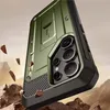 A rugged phone case is shown in a dramatic, rocky environment with debris flying around it. Náhľad obrázku produktu