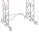 The bottom part of a white metal towel rack with decorative scrollwork. Náhled obrázku produktu
