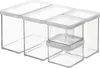 A set of five clear plastic food storage containers with white lids, arranged in a group. Anteprima dell’immagine prodotto