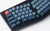 A close-up, angled view of a black mechanical keyboard with blue and red keys. Anteprima dell’immagine prodotto