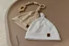 Muminky | Babymützen Set 2 Stück - Beige&Weiß - Baumwolle - Produktbild-Vorschau 3