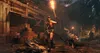 A warrior with a torch and a wolf in a dark, rustic village setting. Produktbild-Vorschau