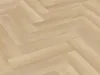 A close-up, angled view of a light-colored wooden floor laid in a herringbone pattern. Produktbild-Vorschau