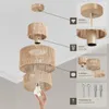 An exploded view diagram of a pendant lamp, showing its components and assembly, with a hand inserting a lightbulb. Produktbild-Vorschau