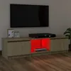 A TV stand with a TV mounted above it, in a dimly lit room. Náhled obrázku produktu