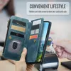 A person is holding a blue wallet-style phone case with cards and cash inserted, while another person is using a credit card at a payment terminal. Anteprima dell’immagine prodotto