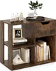 A rustic brown wooden bookshelf with a drawer and multiple compartments, filled with books and decorative items. Podgląd zdjęcia produktu