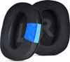 A close-up, cutaway view of two black headphone ear pads, showing the internal layers of one pad. Náhled obrázku produktu