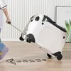 A child is pulling a panda-shaped suitcase. Produktbild-Vorschau