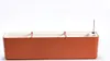 A long, rectangular planter box with three compartments, shown from a side-front angle against a white background. Náhled obrázku produktu