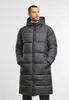 A man wearing a long black puffer jacket. Voir les images du produit