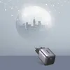A UGREEN charger is placed on a gray surface with a futuristic globe and city skyline in the background. Voir les images du produit