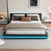 A modern bedroom with a black upholstered bed frame featuring LED lighting. Anteprima dell’immagine prodotto