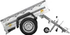 A small trailer is shown tilted upwards on a white background. Podgląd zdjęcia produktu