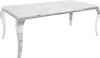 A white marble-topped dining table with polished chrome legs is shown against a white background. Náhled obrázku produktu