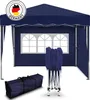 A navy blue pop-up tent is shown, partially assembled, with a carrying bag and folded frame in the foreground. The tent has arched windows. Produktbild-Vorschau