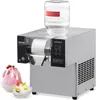 A commercial snow ice maker with a water bottle on top, and two bowls of shaved ice in front. Náhled obrázku produktu