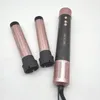 A hair styling tool with two interchangeable attachments, laid out on a white background. Anteprima dell’immagine prodotto