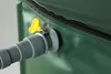 A close-up view of a green water tank with a hose attachment and a yellow handle. Produktbild-Vorschau