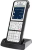 A cordless phone is shown in its charging cradle against a white background. Produktbild-Vorschau