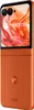 A Motorola Razr 50 flip phone in Spritz Orange is shown in an open position against a white background. Produktbild-Vorschau