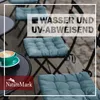 Outdoor cafe setting with chairs and a table with coffee. Produktbild-Vorschau
