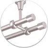 Close-up view of a double curtain rod system mounted to a ceiling. Podgląd zdjęcia produktu