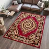 A living room with a sectional sofa, coffee table, and a rug. Náhled obrázku produktu