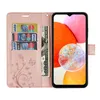 A pink wallet-style phone case with a Samsung Galaxy A14 phone inside. The case has slots for cards and cash, and is decorated with a floral pattern. The phone screen displays a colorful abstract image. Produktbild-Vorschau